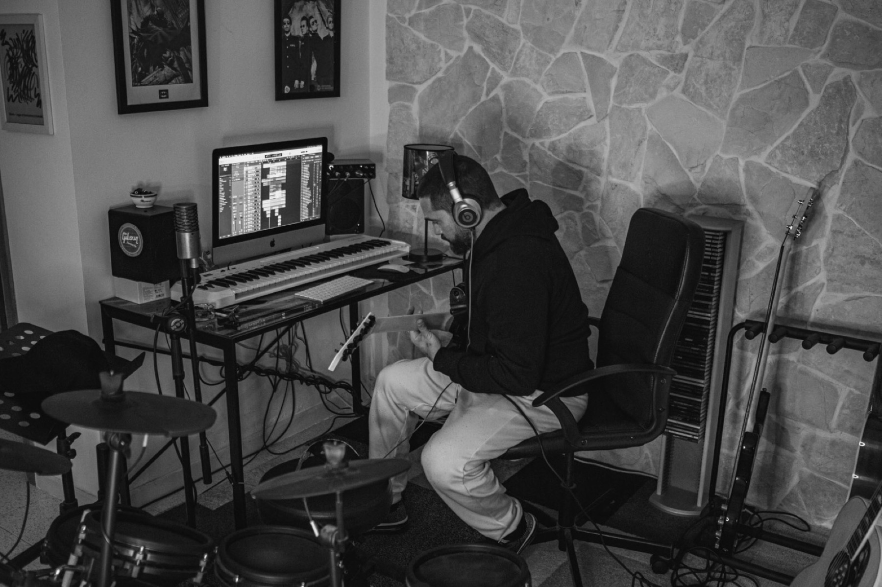 Stefano Eliamo working in a home recording studio